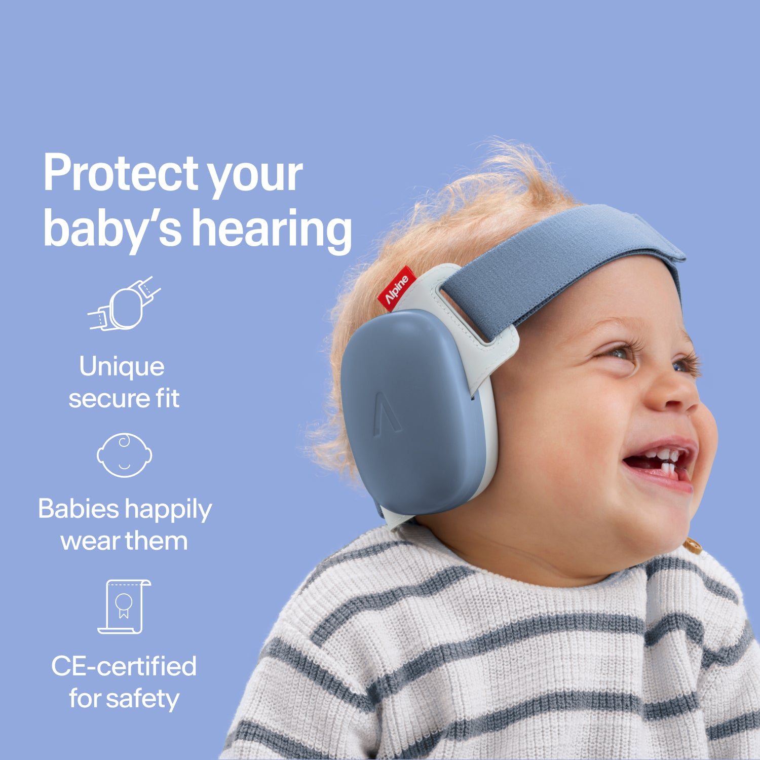 Happy baby wearing blue Alpine ear muffs with secure fit, CE-certified hearing protection