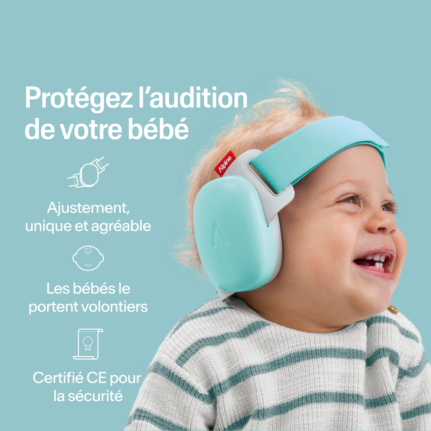 Bébé heureux portant des protège-oreilles Alpine fresh aqua, ajustement sécurisé, protection auditive certifiée CE
