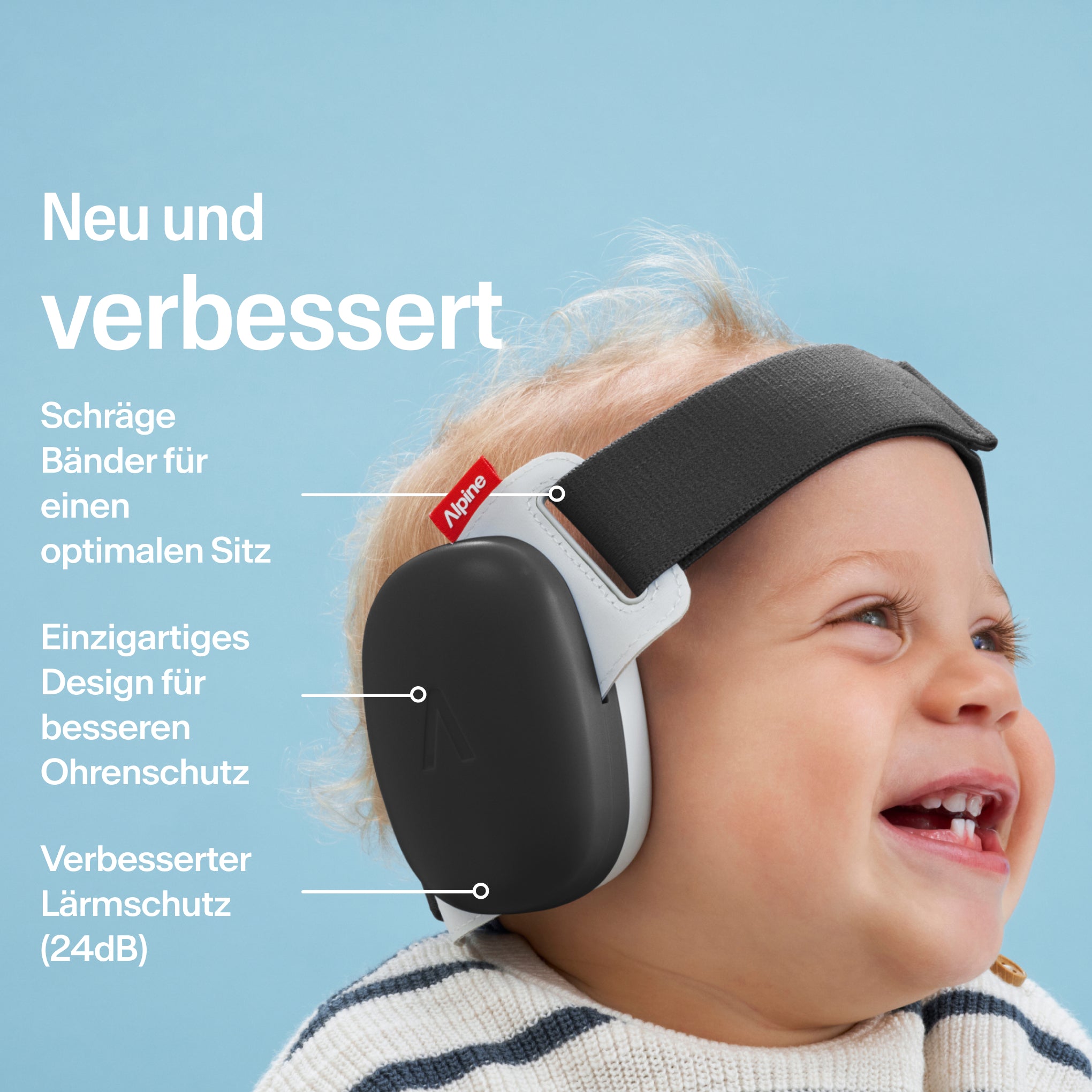 baby traegt alpine muffy baby in schwarz auf dem kopf