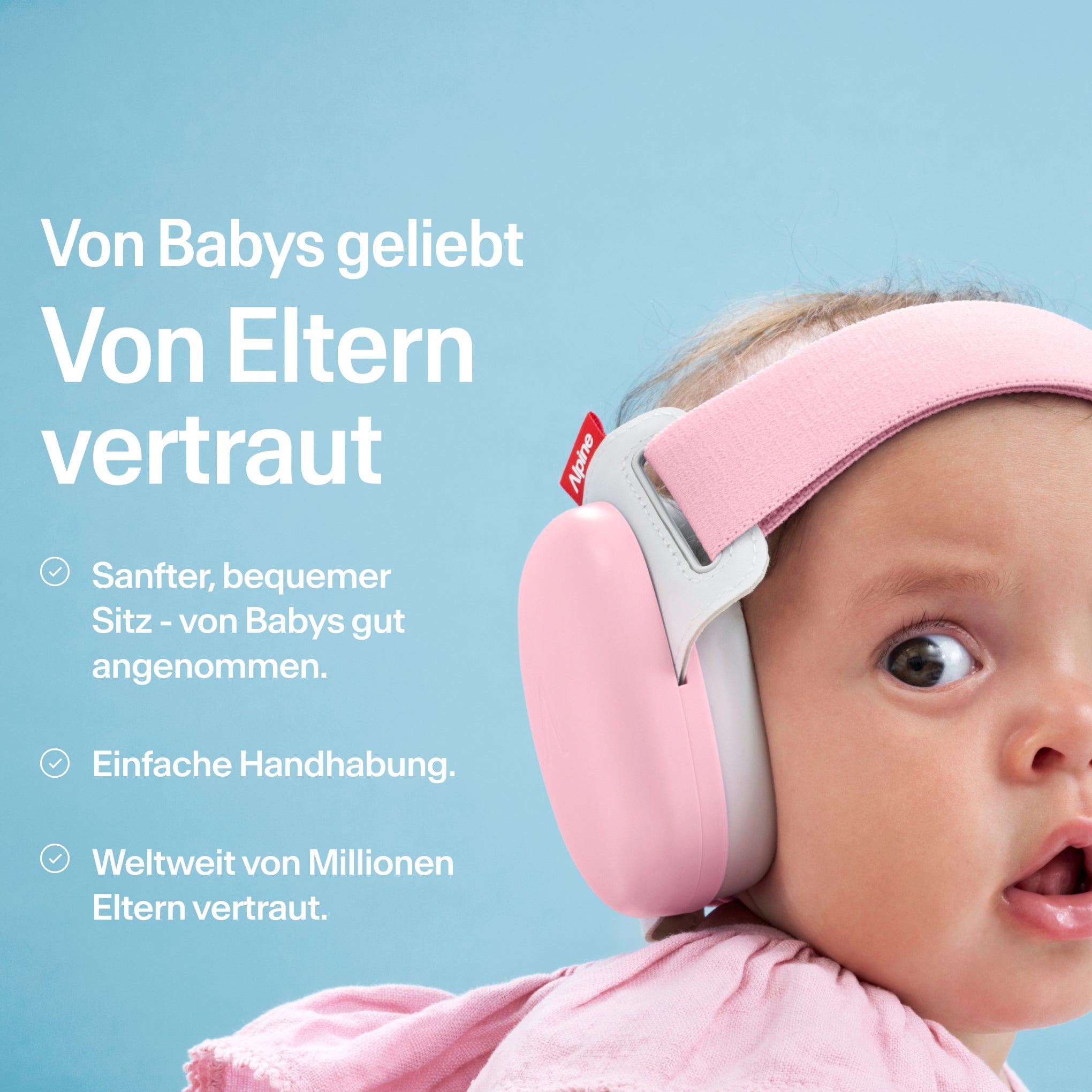 baby trägt alpine muffy baby in rose pink auf dem kopf