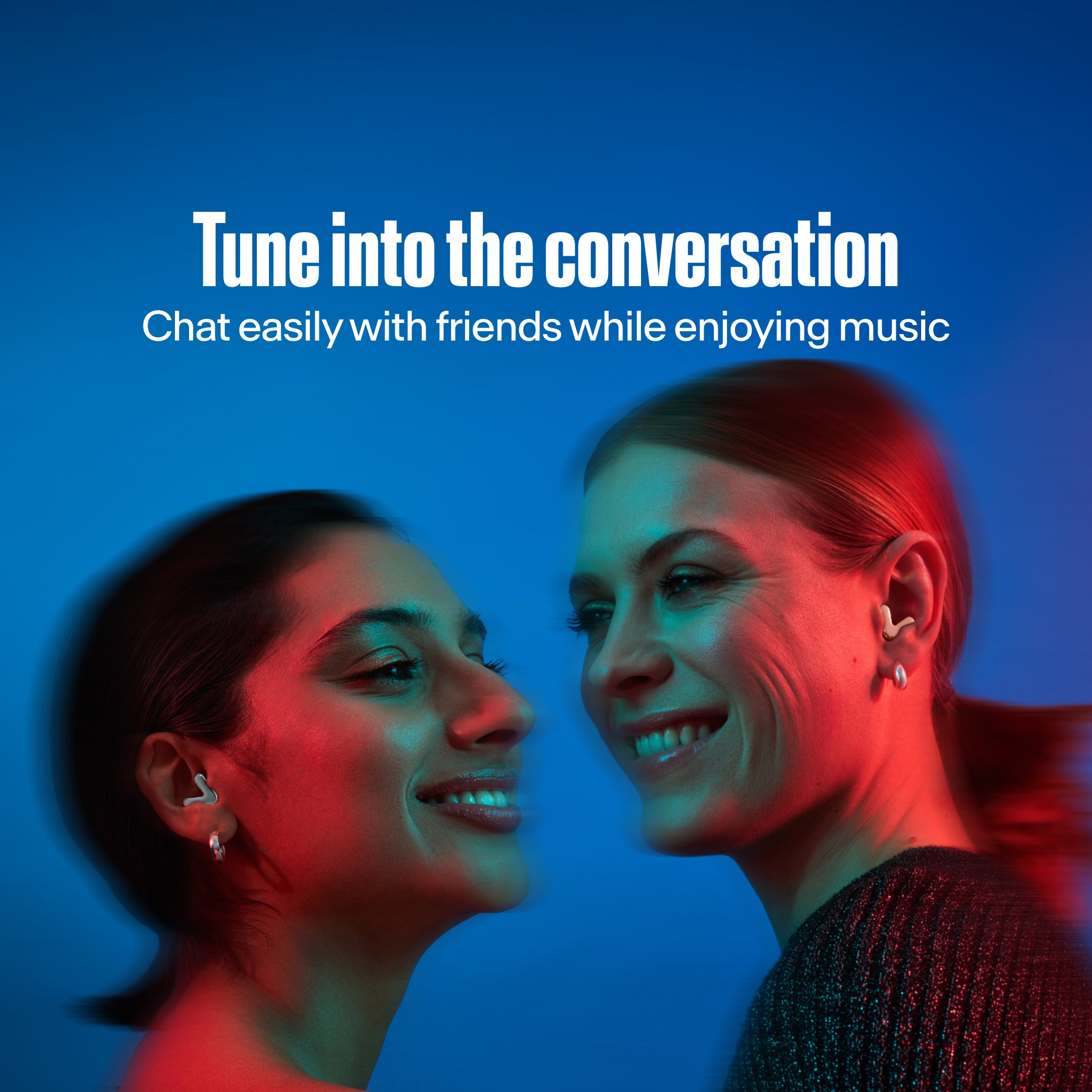 Two women with Alpine Tune in rose-gold and silver dance together 